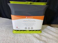 Closed kitchen compost collector with front label visible showing brand Full Circle and product name Fresh Air.