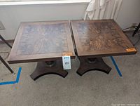 Angle view from above of the pair of wood end tables showing overall size and shape.