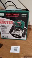 Box showing Craftsman router features and branding.
