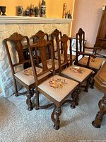 Group of six chairs front view near fireplace