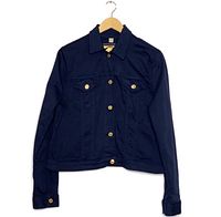 Front view of navy cropped denim jacket with gold-tone buttons, pointed collar, and flap chest pockets on hanger.