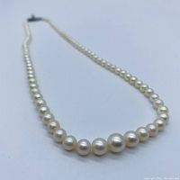 Close-up of center pearls showing largest bead size and luster