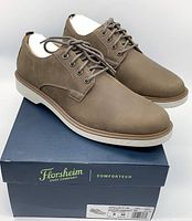 Pair of men's Florsheim Supacush plain toe Oxford shoes in mushroom color, displayed on original Florsheim Comfortech box.