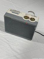 Front view of Airworks FH2000 air heater showing control dials and indicator light.