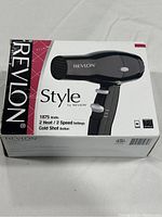 Front view of Revlon Style hair dryer retail box showing 1875 watts power, 2 heat, 2 speed settings, cold shot button details.
