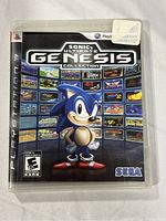 Front cover of the PlayStation 3 game Sonic's Ultimate Genesis Collection showing artwork and branding.