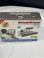Box of the SVAT Web Ready DVR System showing branding, model, and system features