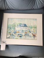 Framed watercolour painting of Kingston Yacht Club with sailboats, showing overall front view.