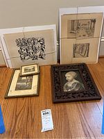 Overview of all five pieces including framed and unframed prints, original drawings, and antique carved wood frame with portrait.