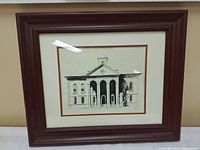 Full view of the framed black and white ink drawing of the County Court House showing architectural details and frame.