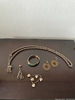 Full shot of all jewelry items together showing necklace, earrings, bracelets