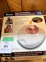 Photo of boxed Kaz Vaporizer/Humidifier 3.8 liter capacity with night-light feature