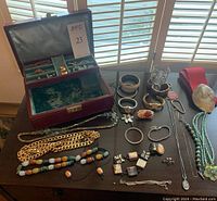 Overall view of assorted jewelry on tabletop