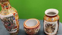 Three cloisonné vases with colorful Japanese cloisonné bird and floral scenes
