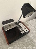 AM/FM clock radio with alarm clock and desk lamp in Mid-Century Modern style