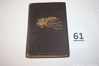 Closed view of the book's front cover showing dark hardback with gold embossed title "Poets and Poetry of Chester County Penna."