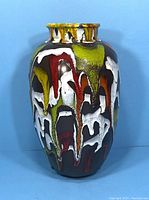 Front and side views of the vintage drip glaze pottery vase showing colorful glaze and cut-out rim design