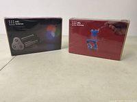 Two MEL Science kits sealed in shrink wrap, displayed front-facing showing box artwork and branding.