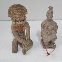 Both statues together showing size and detailing