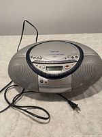 Sony CPD-S500 portable boom box showing top CD player and front speakers with control buttons and power cord visible