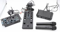 Front view of Pyle PMX7BU rackmount mixing board, Native Instruments Traktor Kontrol Z1 USB mixing board, Pyle wireless mic receiver and two handheld wireless microphones along with cords and power adapter.