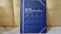 Outer blue cover folder titled 'Canadian Small Cent Collection 1920 to Date' with embossed text.