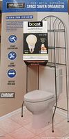 Photo of box showing 3-tier metal bathroom space saver organizer setup over toilet, with dimensions and features listed, and Boost smart WiFi bulb placed on box.
