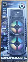 Front view of the box showing Biconic Soundmate Bluetooth speaker with two circular LED-lit drivers and color changing lights symbol