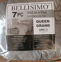 Photo of Bellisimo branded packaging showing the 7-piece queen bed in a bag set, listing all included items and dimensions.
