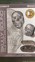 Front view of retail box showing skull design wireless earbud and brand Fisher, Bluetooth, Google Assistant logo.