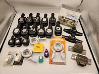 Full lot of 27 metal punches with all visible pieces including Stampin Up, Fiskars, smaller punches, and Martha Stewart boxed set