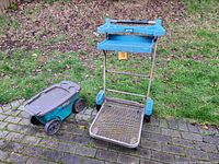 Full view of ORGO foldable gardening cart with blue trays and metal frame alongside Suncast Garden Scooter plastic rolling cart.
