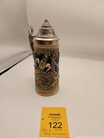 Full view of the Gerz beer stein with fox hunt scene, showing the front and detailing of the piece with the hinged pewter lid and wide base.