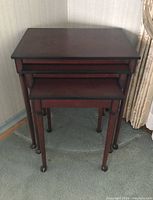 All three tables nested together in a corner