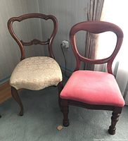 Two vintage Baetz Bros balloon back chairs side by side, showing overall look, upholstery difference, and wood finish.