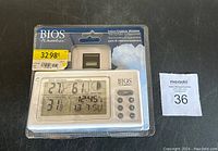 Packaged BIOS Weather indoor/outdoor wireless thermometer and hygrometer with visible branding and price sticker.