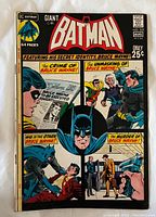 Front cover of Batman comic book #233 featuring Bruce Wayne story panels