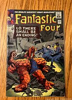 Front cover of Fantastic Four issue #43 comic book showing main characters and issue details.