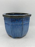 Another front view of the same planter demonstrating consistent blue glaze and vintage condition.
