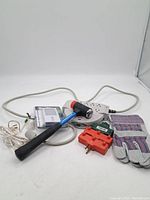 Duplicate photo showing hardware and electrical items