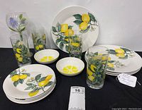 View of the full set showing all dinner plates, lunch plates, lemon tumblers, and Kate Spade Lenox bowls with lemon slice design.