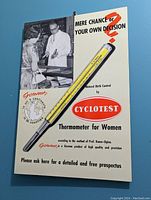 Photo of a rectangular vintage metal advertising sign for Cyclotest Thermometer for Women, featuring a black and white photograph, thermometer attached and promotional text.