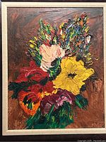 Front view of large oil painting showing colorful floral bouquet with thick textured paint and framed in dark wood frame with lighter trim