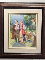 Framed 8x10 watercolor depicting a man and woman in traditional clothing with turkeys and geese outside near a fence and foliage.