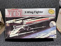 Box front showing Star Wars Return of the Jedi X-Wing Fighter artwork and branding.