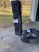 Tent stored in black carrying bag with Seasonal Trends label