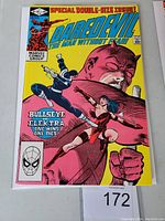 Front cover of Daredevil #181 showing Bullseye and Elektra in action with bold yellow background and comic title in blue and red.