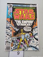 Front cover of Star Wars #18 Marvel comic book showing the title, issue number, price, and artwork featuring C-3PO and stormtroopers with speech bubble.
