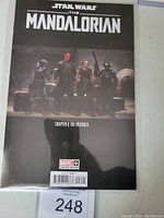 Front cover of Star Wars The Mandalorian #6 variant comic book showing main characters and issue details.