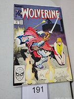 Front cover showing titled Wolverine #3 with medieval knight and woman in yellow dress.